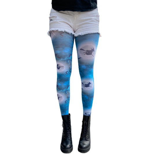 Blue witch patterned tights for women by Malka Chic with Halloween design