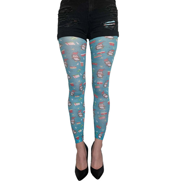 Penguin holiday tights by Malka Chic with winter themed design