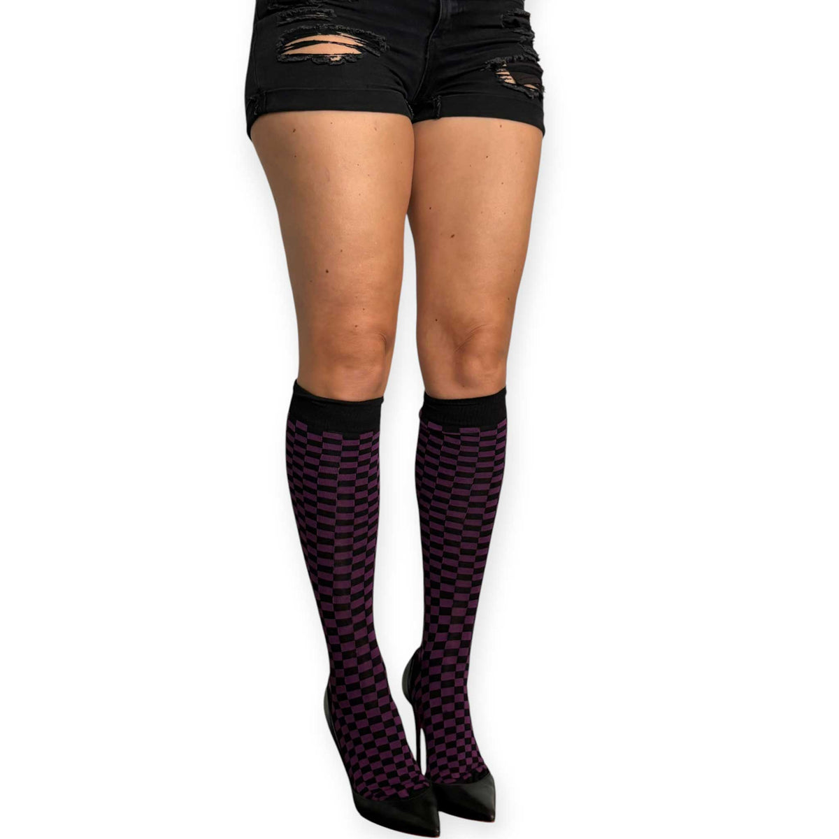 Women’s checkerboard knee-high socks by Malka Chic with alternating purple and black squares.