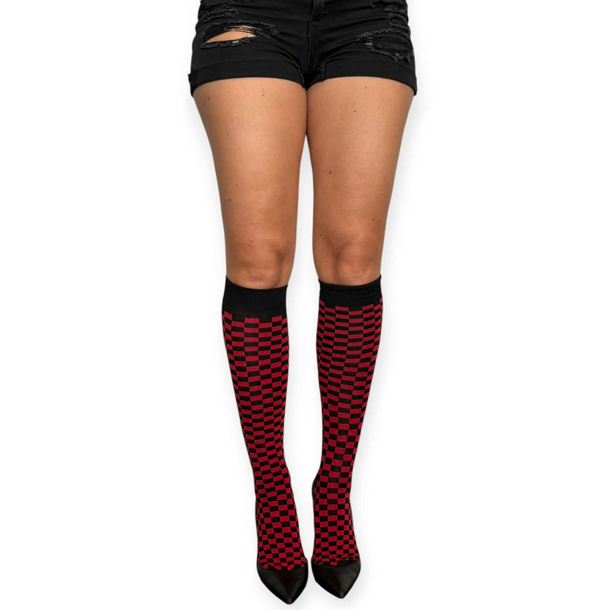 Women’s checkerboard knee-high socks by Malka Chic with alternating red and black squares.