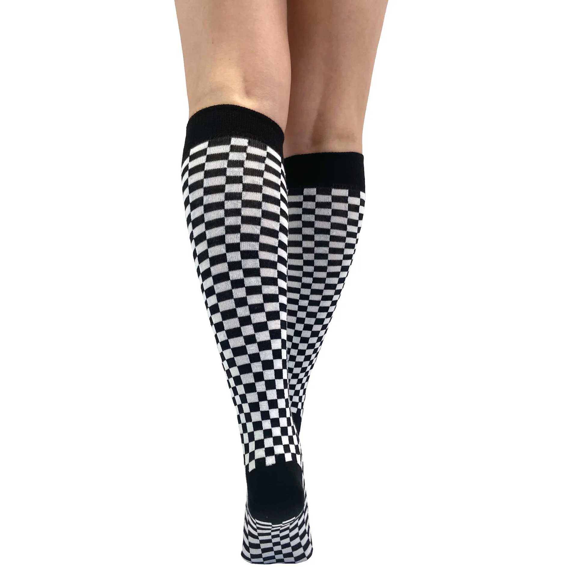 Women's black and white checkered knee-high socks with a warped checkerboard design, soft knit fabric, and retro-inspired style.