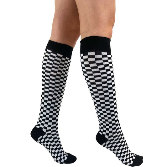 Black and white checkerboard knee-high socks for women featuring a bold optical illusion pattern and comfortable stretch fit by Malka Chic.