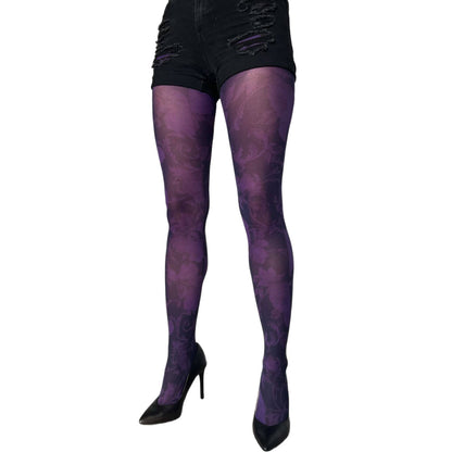 Purple floral patterned tights worn with black high heels sold at Malka Chic