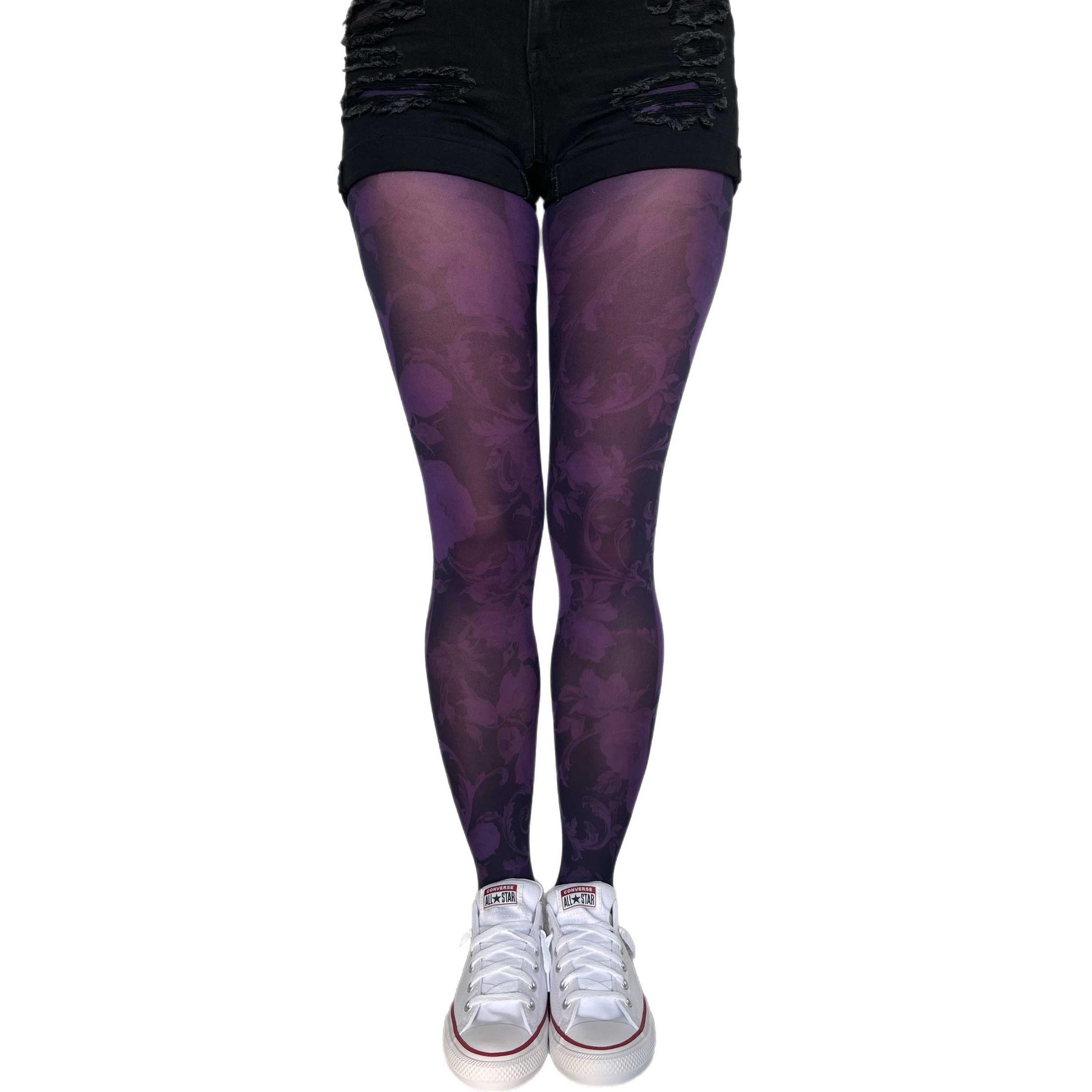Purple floral patterned tights worn with sneakers sold at Malka Chic