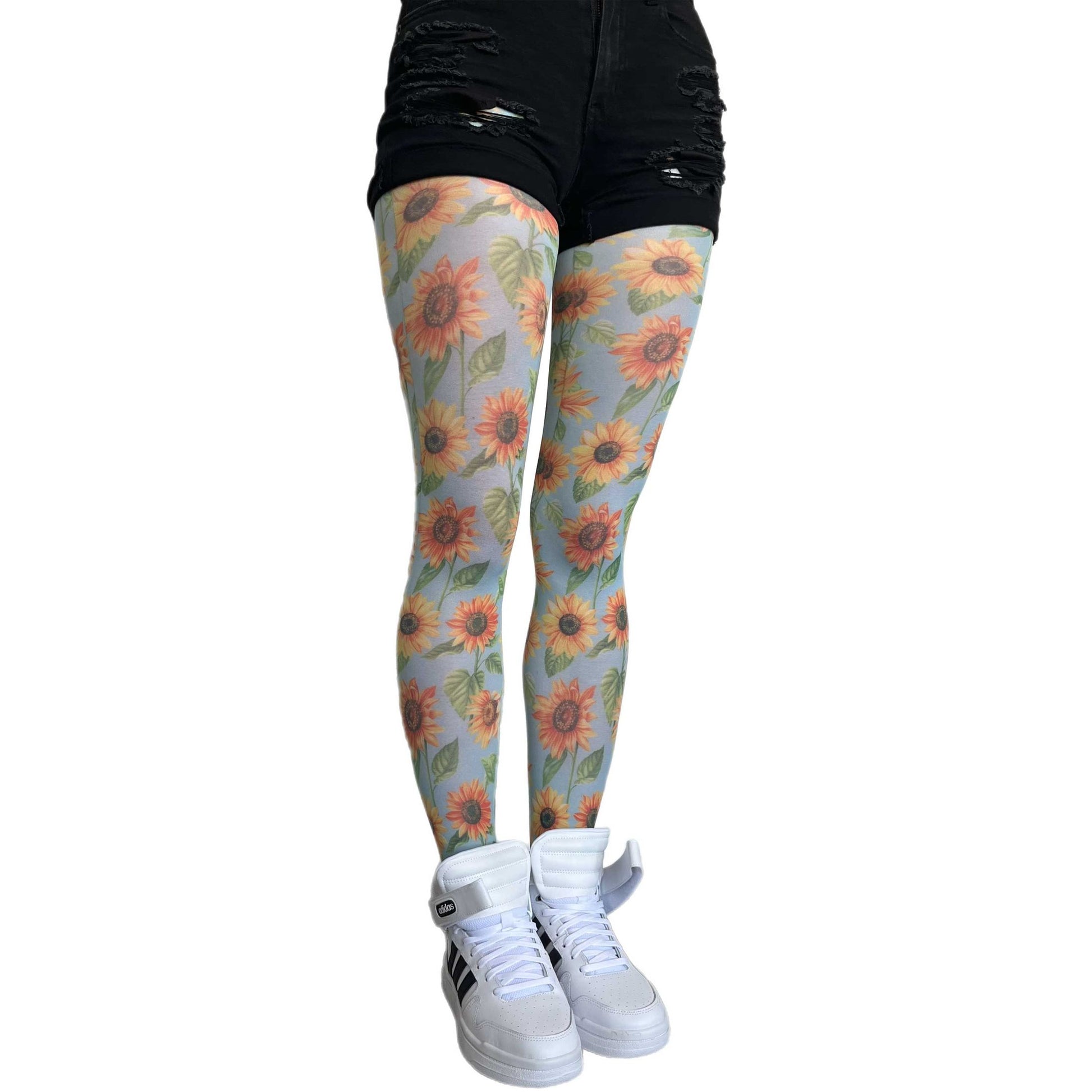 Yellow sunflower patterned tights for women by Malka Chic, floral hosiery adding fun and positive style to outfits.
