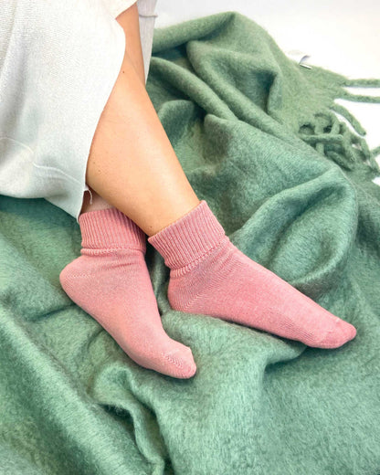 Cozy soft pink comfort socks for women perfect for lounging and casual wear