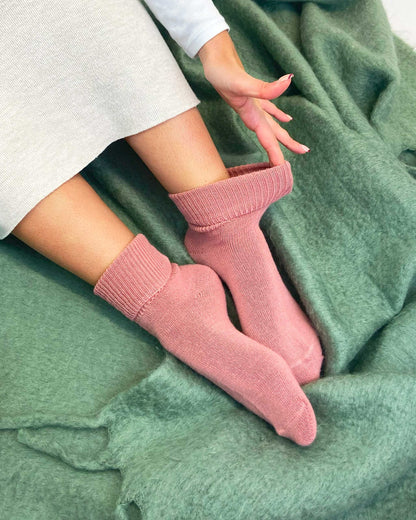 Ultra-soft pink women's socks with relaxed fit and ribbed design for all-day comfort