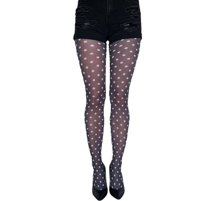 Woman wearing white polka dot tights – 50 denier opaque legwear