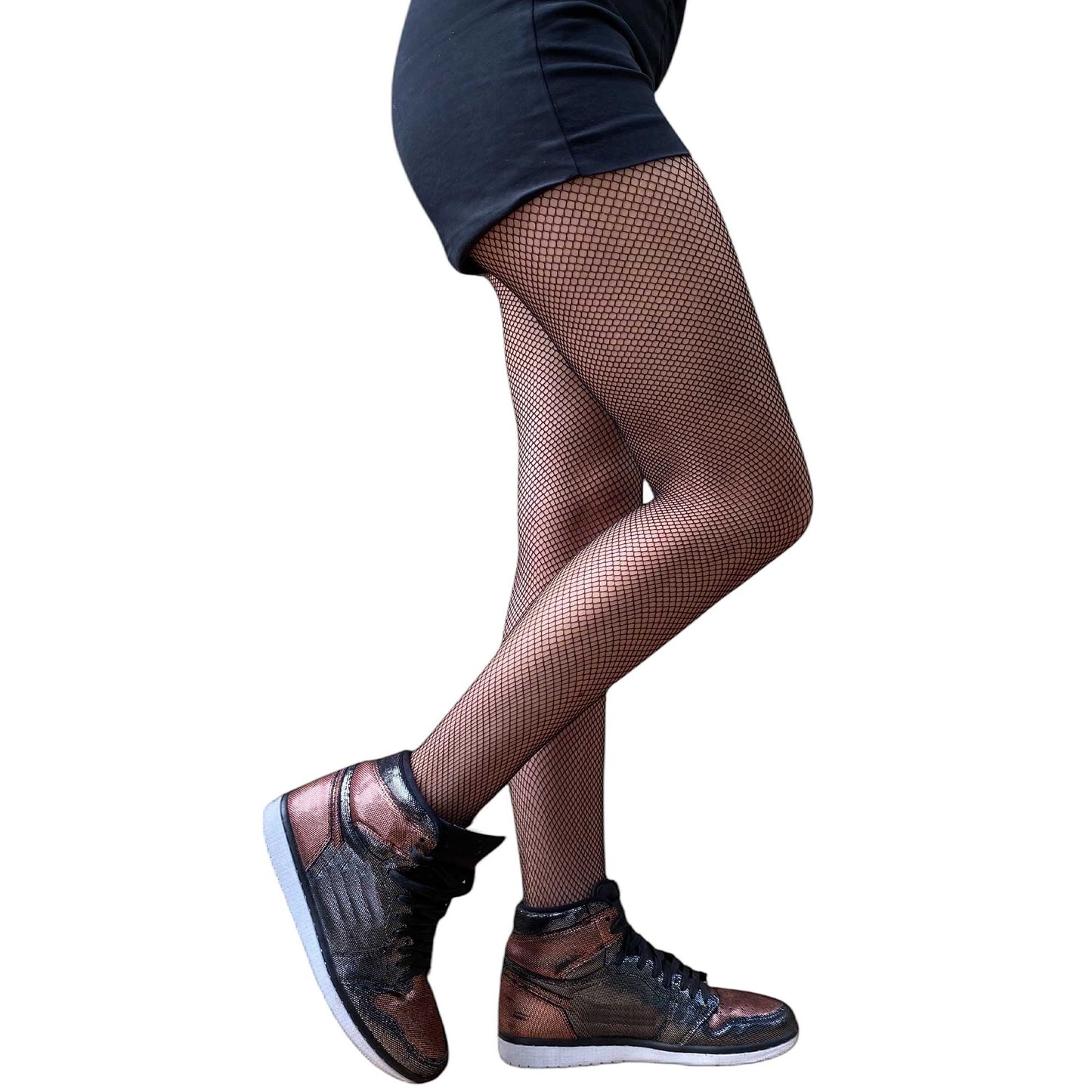 Women wearing black fishnet pantyhose styled with sneakers and shorts