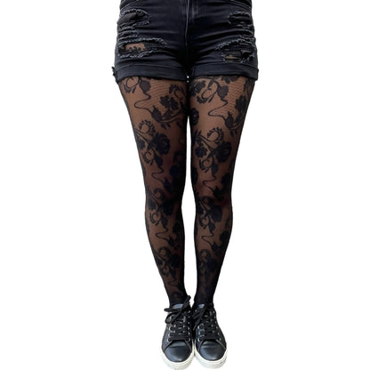 Woman wearing black flower lace tights – elegant and feminine outfit