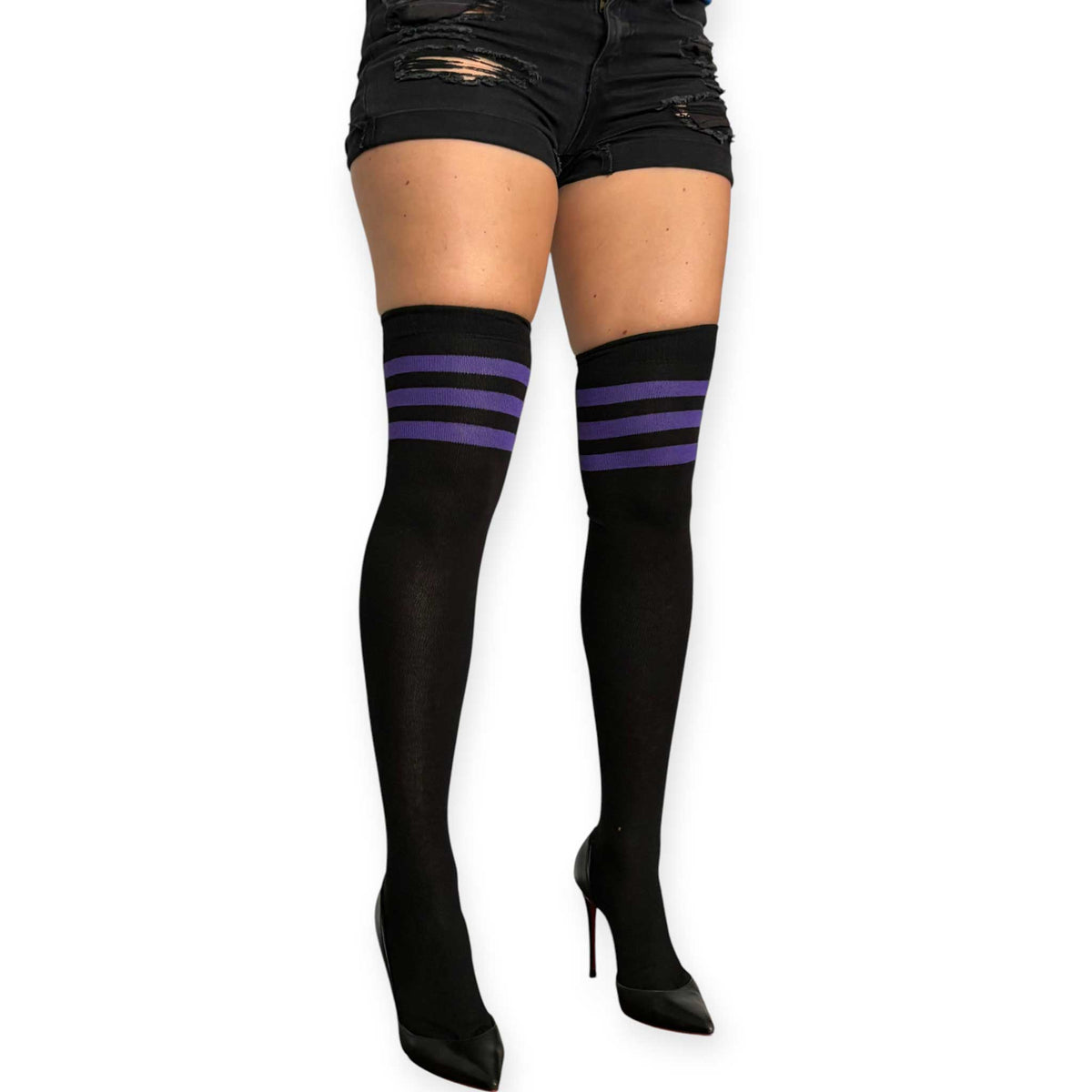Black and purple over the knee socks for women by Malka Chic with three purple stripes at the top, styled with black shorts and heels.