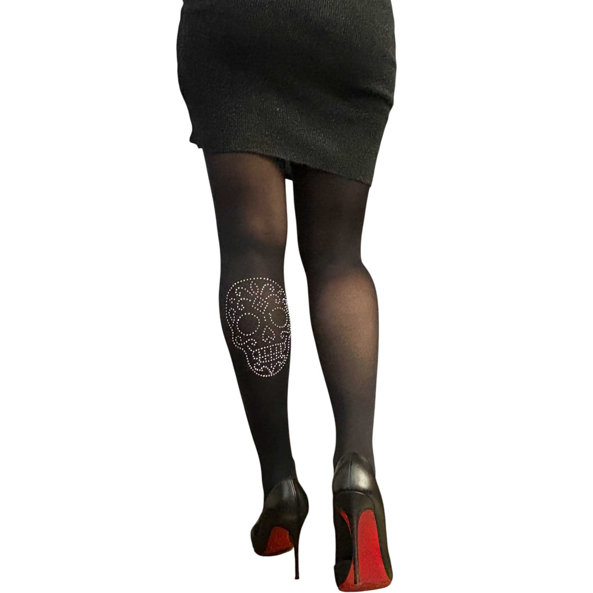 Women’s black rhinestone tights featuring a decorative silver sugar skull motif.