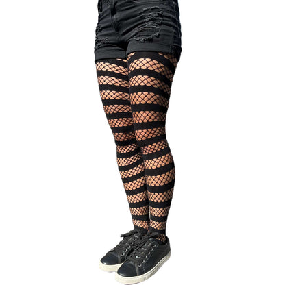 Close-up of black fishnet tights with stripe pattern – textured design