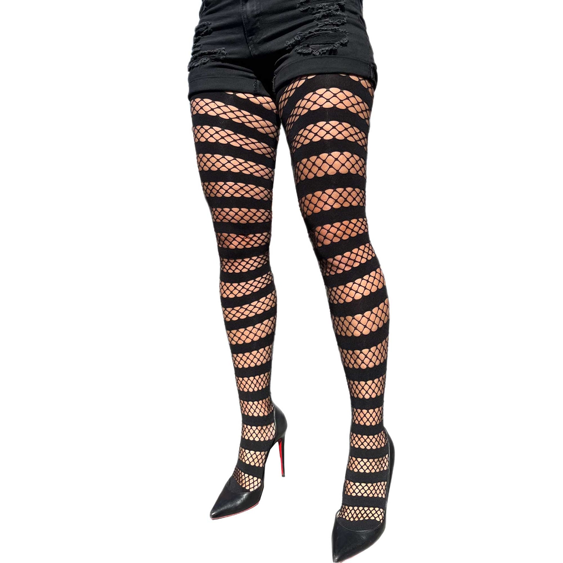 Woman wearing black striped fishnet tights – bold fashion outfit
