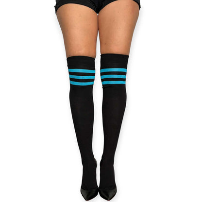 Malka Chic black over the knee socks for women with turquoise triple-stripe detail, styled with black shorts and pointed heels.