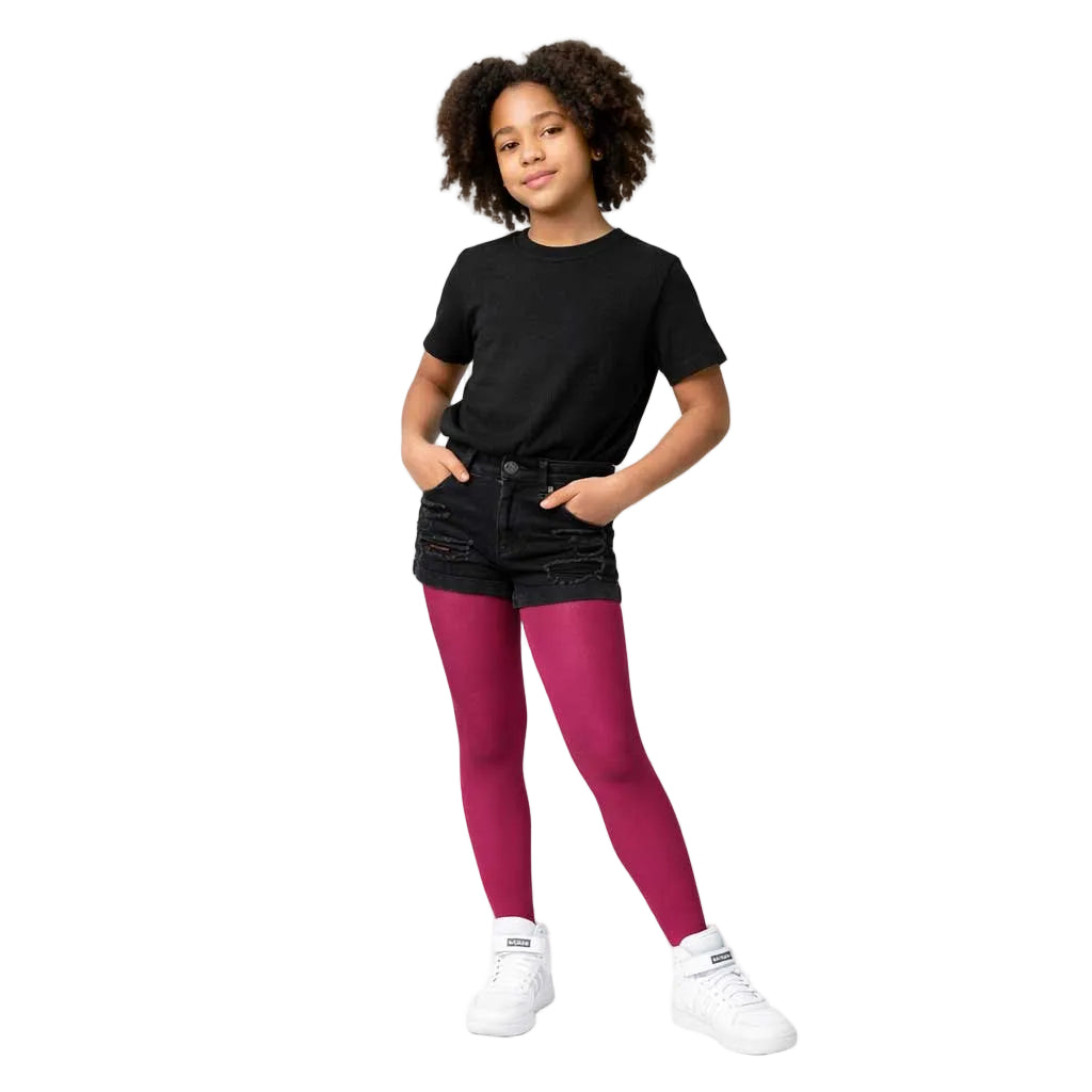 Girl wearing cherry pink opaque tights – soft and comfortable everyday tights for kids 2
