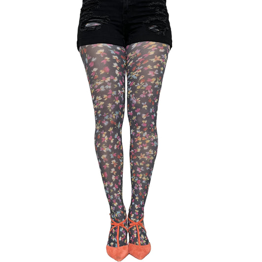 Black ditsy floral tights for women by Malka Chic featuring delicate small flower pattern on sheer hosiery.