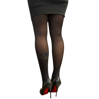 Women’s black rhinestone tights featuring a gold evil eye design by Malka Chic.