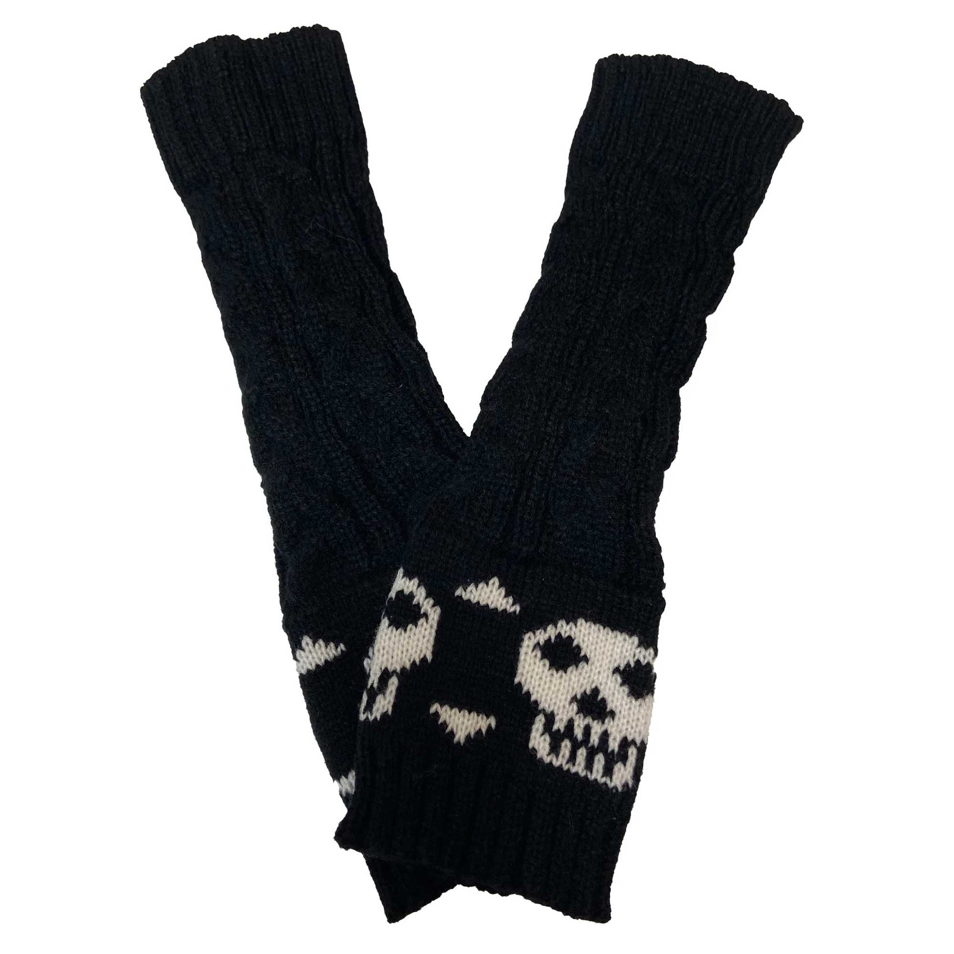 Knitted skull and crossbones fingerless gloves for women with long black arm warmer design.