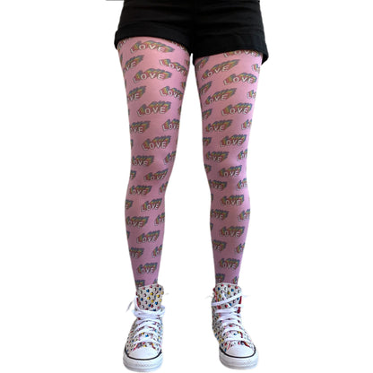 Malka Chic pride tights with vibrant rainbow pattern for bold and expressive outfits.