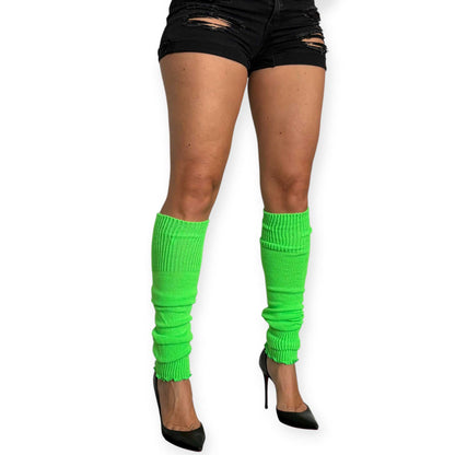 Bright green leg warmers worn slouched with black pumps.