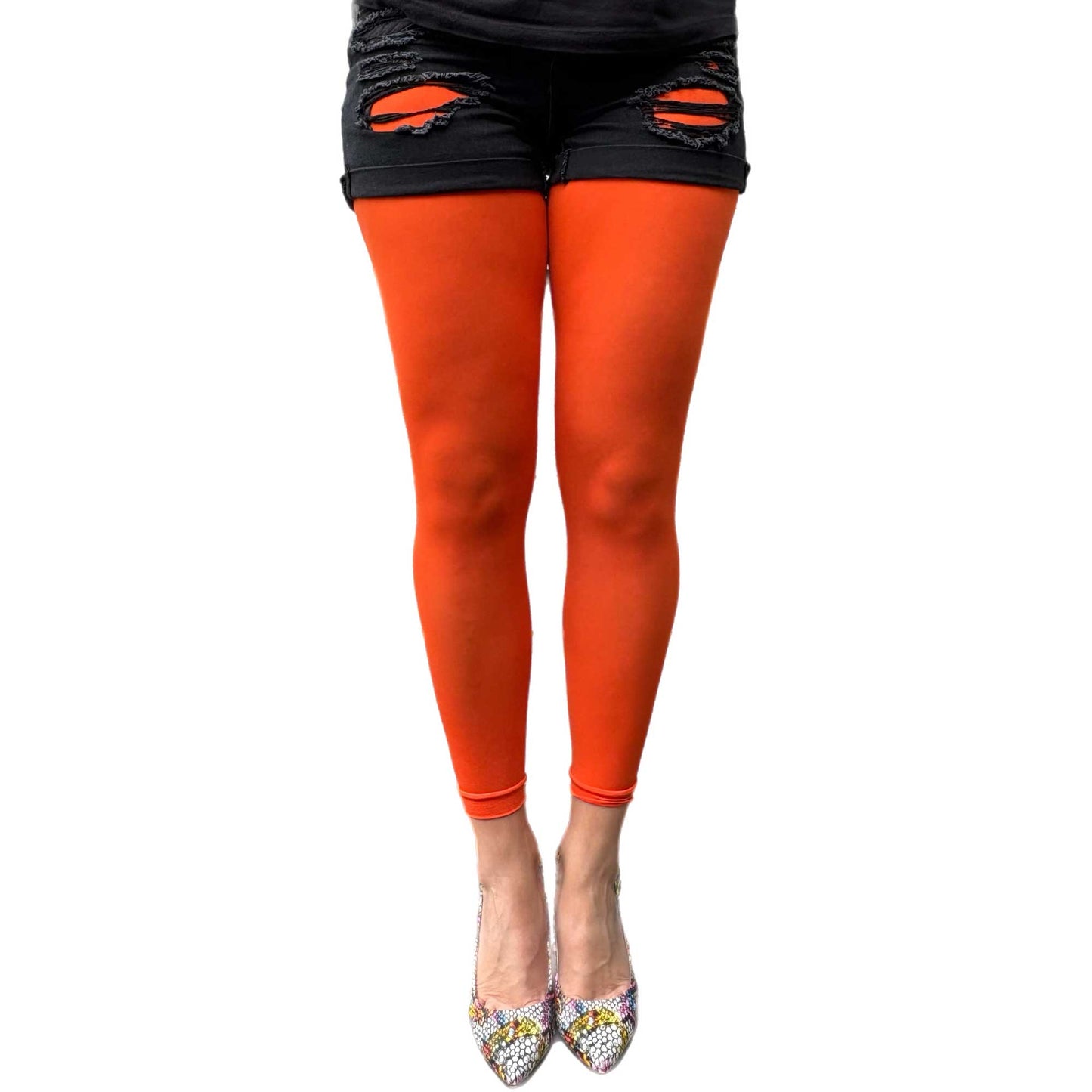 Vibrant tangerine footless tights styled for colorful everyday wear