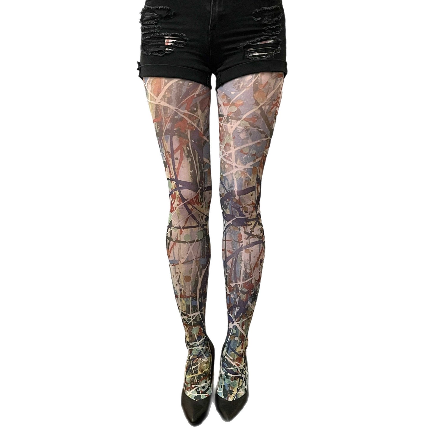Woman wearing paint patterned tights – vibrant and creative fashion tights