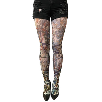 Woman wearing paint patterned tights – vibrant and creative fashion tights