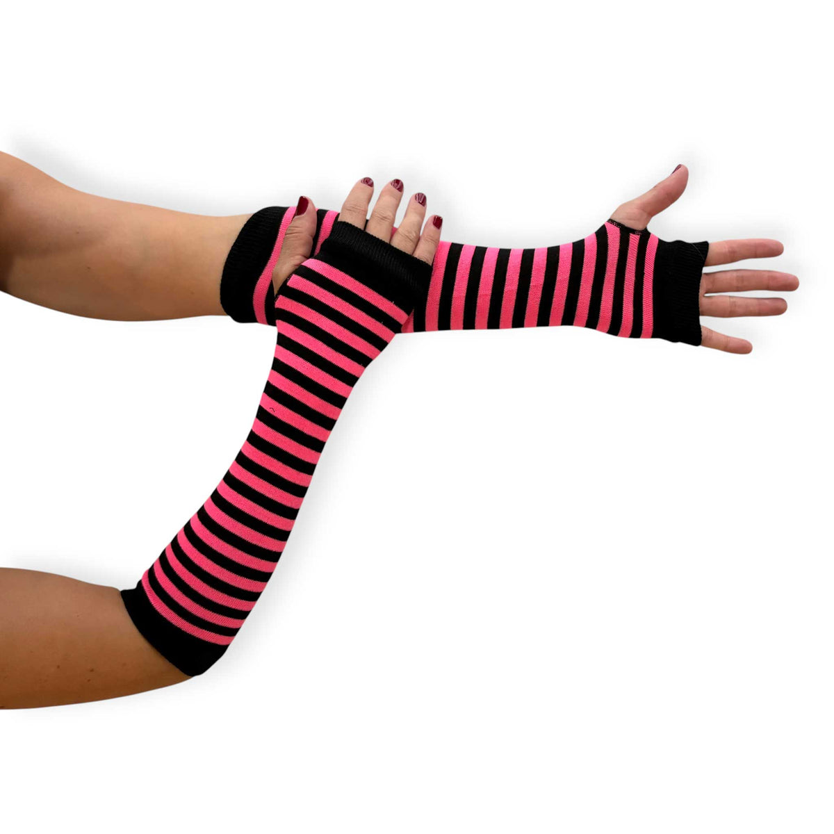 Bright pink and black striped fingerless gloves for women by Malka Chic with long arm warmer styling.