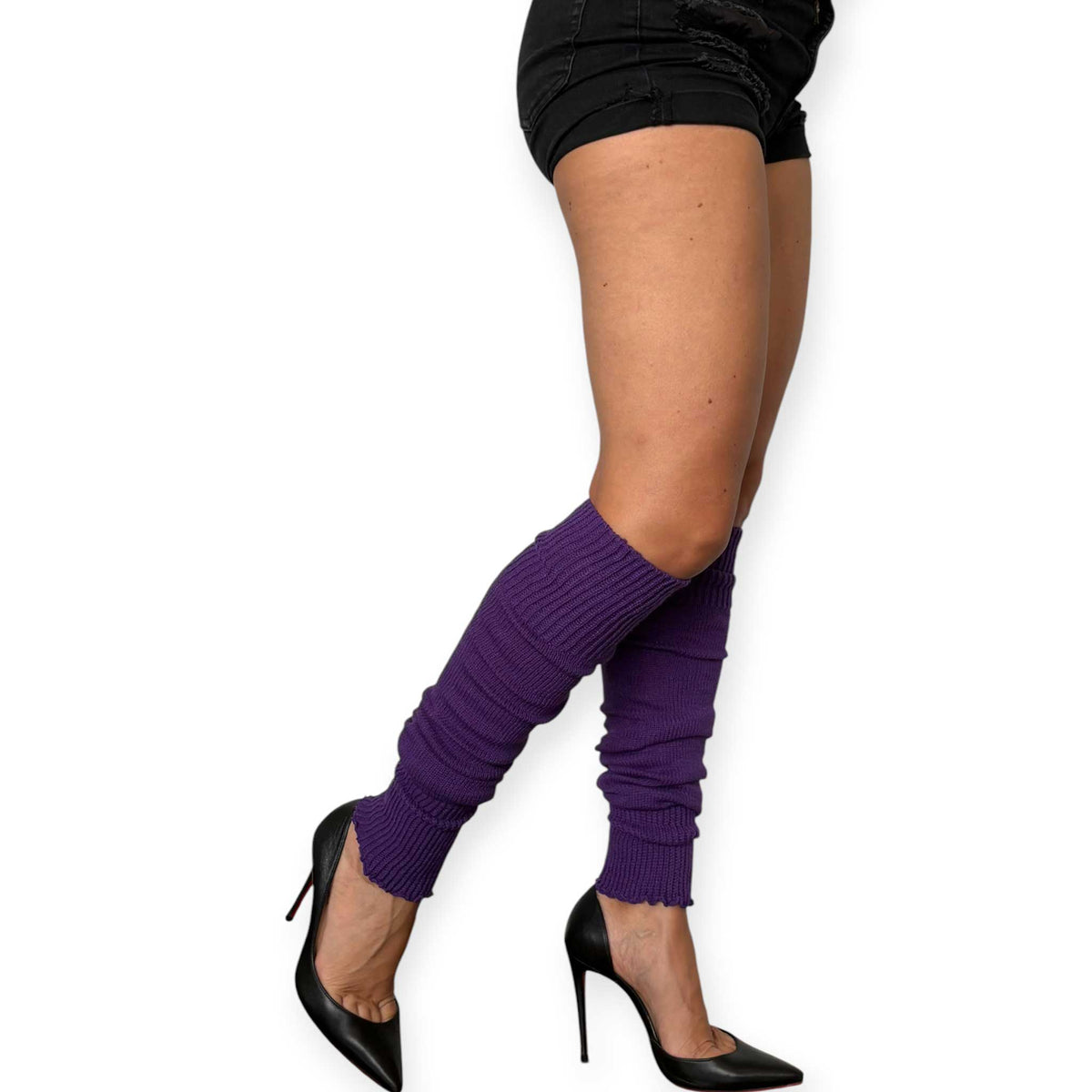 Deep purple leg warmers styled as a bold fashion accessory.