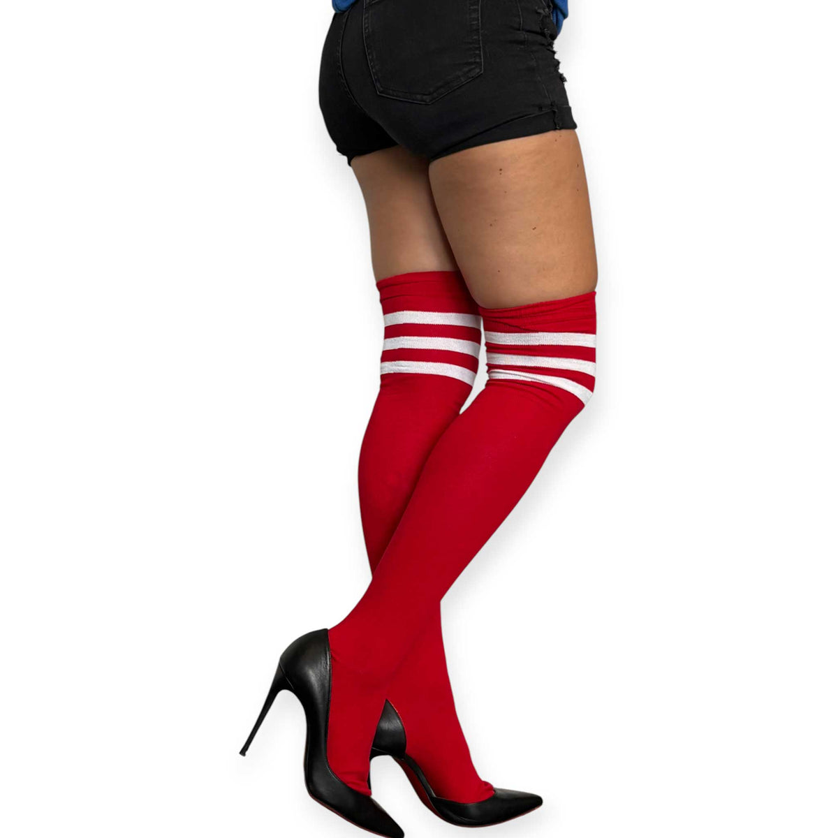 Side view of Malka Chic red thigh high socks for women featuring white horizontal stripes and black pointed toe heels.