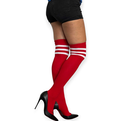 Side view of Malka Chic red thigh high socks for women featuring white horizontal stripes and black pointed toe heels.