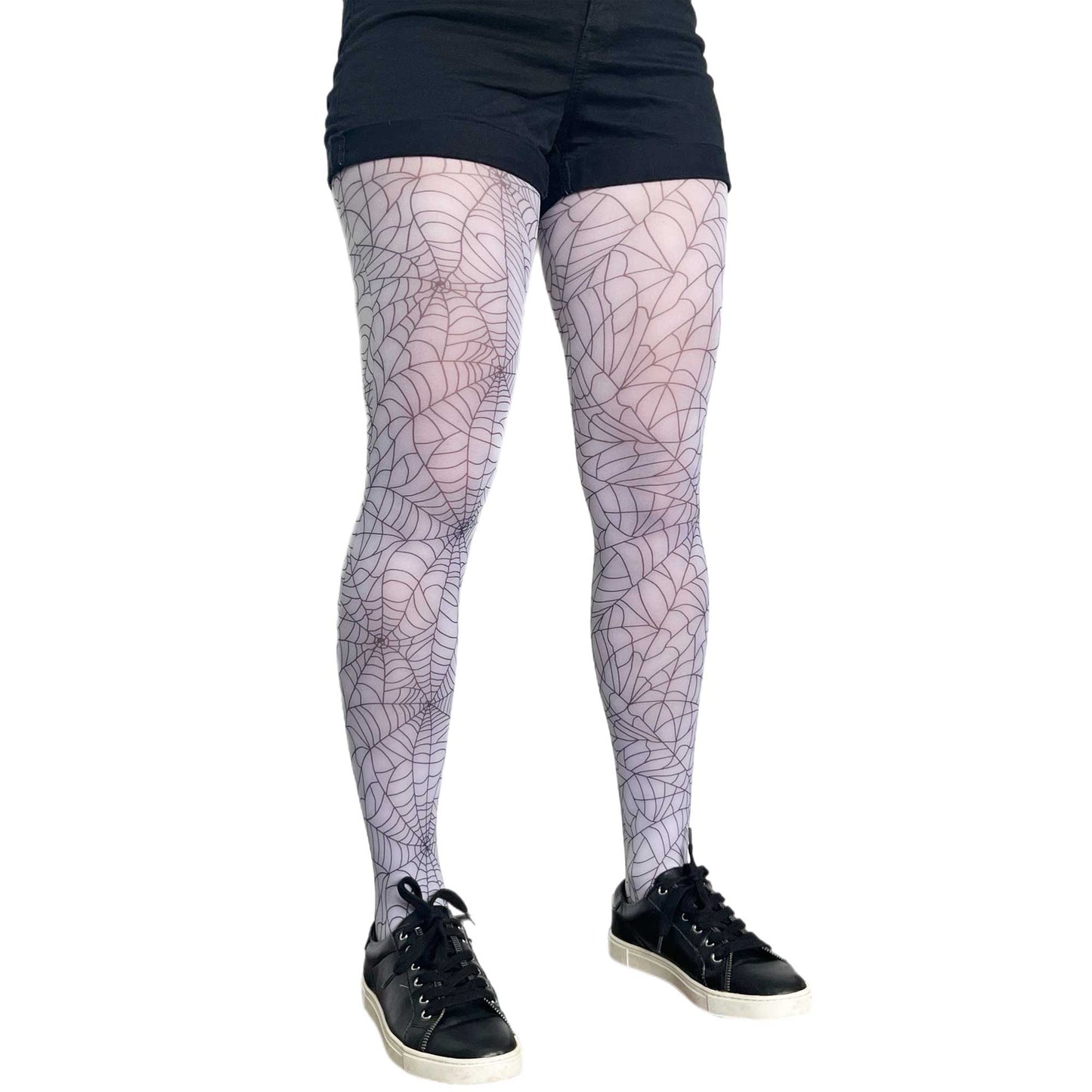 White spider web print tights by Malka Chic, bold patterned hosiery for Halloween outfits and creative everyday style.