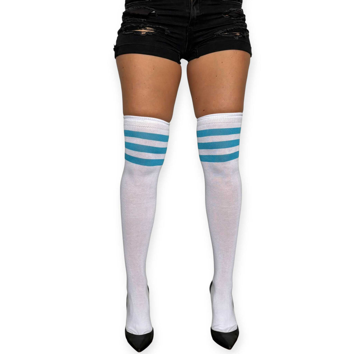 White and turquoise over the knee socks for women by Malka Chic with sporty triple-stripe detail, styled with black shorts and heels.