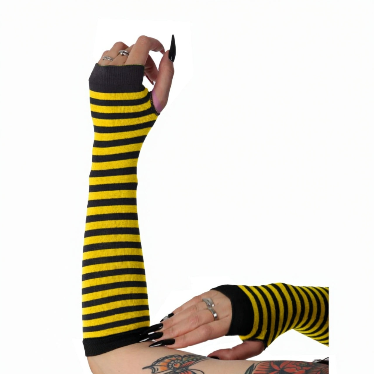 Yellow and black striped fingerless gloves for women with long knit arm warmer design.